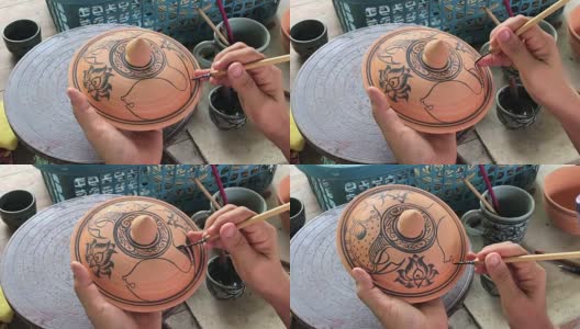 近手装饰陶瓷青瓷，素可泰泰艺术，制作泰国陶瓷工艺品高清在线视频素材下载