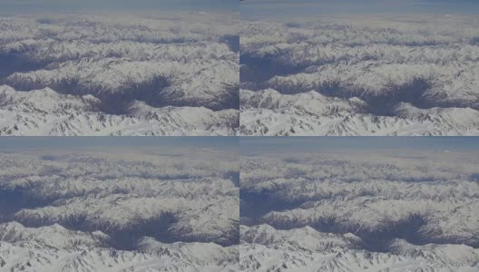 从西藏鸟瞰喜马拉雅山。从飞机窗口观看高清在线视频素材下载