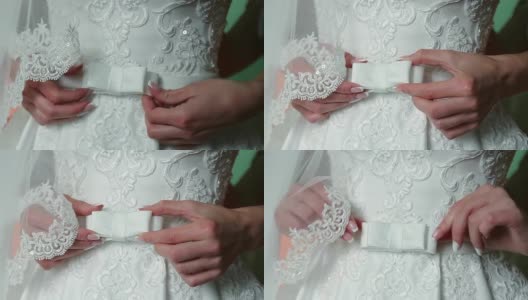 婚礼上，新娘穿着礼服、鞋子、珠宝高清在线视频素材下载