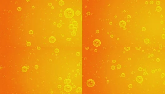 背景是橘黄。气泡的空气在水平运动时参照左边。黄金泡沫的空气。项目背景，休息，油，蜂蜜，啤酒，果汁，洗发水或其他成功的选择。高清在线视频素材下载