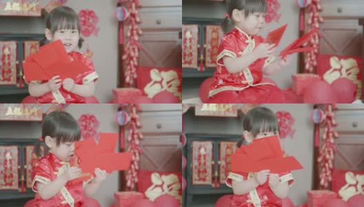 中国小女孩在家庆祝春节高清在线视频素材下载