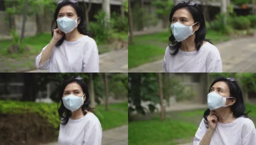 因空气污染而戴防护口罩的女人高清在线视频素材下载