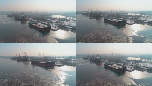 鸟瞰图的工业港口与商业船舶和货物集装箱在冬季。高清在线视频素材下载