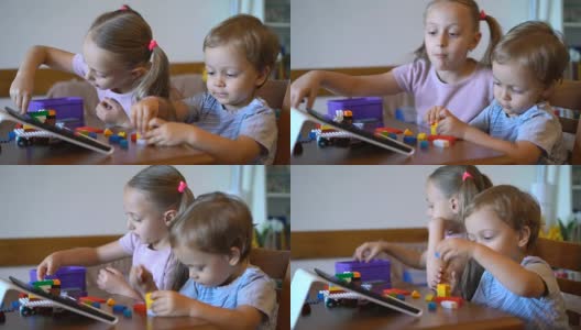 姐姐和弟弟在家里玩塑料砖高清在线视频素材下载