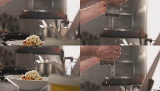 在意大利面上磨奶酪高清在线视频素材下载