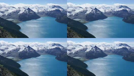 从山顶俯瞰蓝绿色的湖泊高清在线视频素材下载