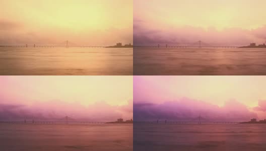 晚上到晚上的时间流逝拍摄的Bandra- Worli海连接(桥)在阿拉伯海与云的形成和变化的天际线在背景，孟买，印度高清在线视频素材下载