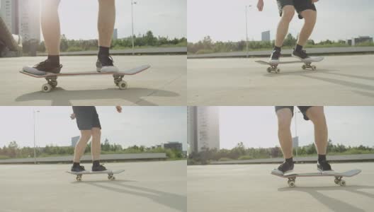 慢镜头特写:滑板者跳跃和做魔术在阳光城市街道高清在线视频素材下载