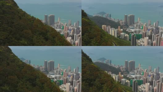 白天香港市景生活综合大楼维多利亚山顶空中全景4k高清在线视频素材下载