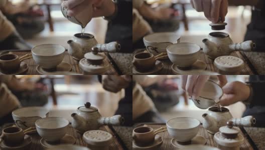 传统泡茶——将红茶倒入杯中高清在线视频素材下载
