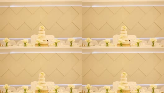 漂亮的婚礼蛋糕装饰着鲜花高清在线视频素材下载