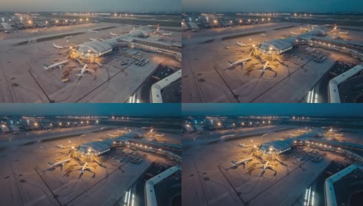 间隔拍摄。北京首都国际机场日落航站楼鸟瞰图高清在线视频素材下载