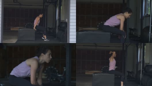 吸引人的民族妇女在家庭健身房锻炼高清在线视频素材下载