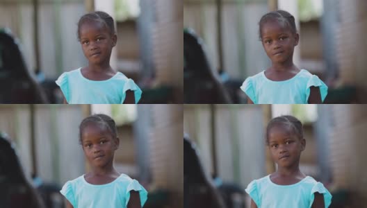 可爱的微笑害羞的特写非洲小镇女孩高清在线视频素材下载