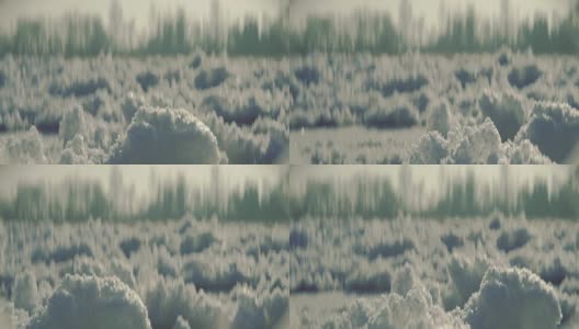 田园诗般的冬季景观。冰冻雪的特写镜头高清在线视频素材下载