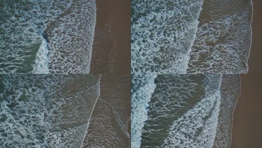 无人机拍摄的海浪在岸上产生纹理高清在线视频素材下载