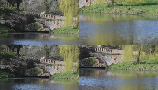 穿过湖到英国乡村的旧桥高清在线视频素材下载