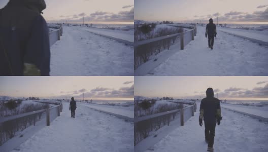 一个人在罗浮敦岛的勒奈观景台上行走，标志着冬天的到来高清在线视频素材下载