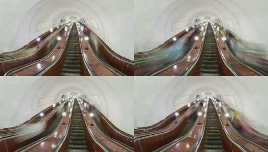 人们在地铁的自动扶梯上移动高清在线视频素材下载