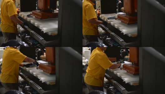 一个在鞋厂用压力机的人高清在线视频素材下载