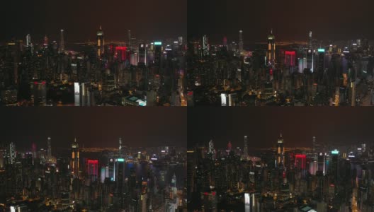 夜景照亮香港市区，航拍全景为4k高清在线视频素材下载