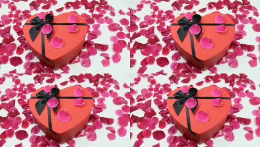 红色心形礼盒和玫瑰花瓣高清在线视频素材下载