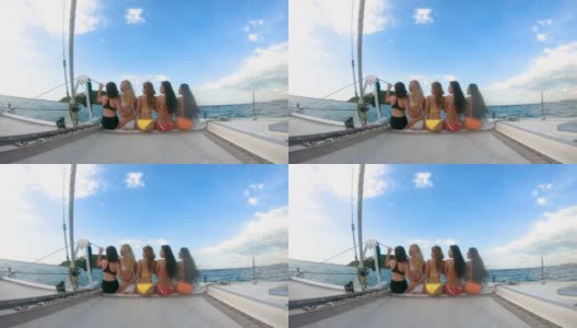 宽拍美女亚洲女人穿着比基尼幸福在豪华游艇甲板上与蓝天和海湾的泰国芭堤雅高清在线视频素材下载
