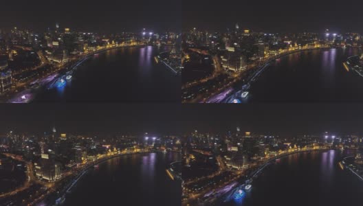 外滩堤岸和夜景照明上海城市景观。浦西和黄浦江。鸟瞰图。无人机是向前和向上飞行高清在线视频素材下载
