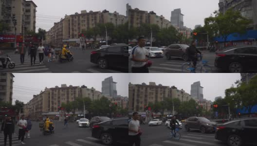 暮色时分南京市老城区交通街道十字路口慢镜头全景4k中国高清在线视频素材下载