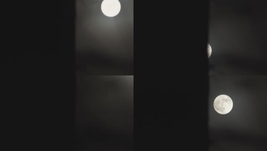 满月出现在黑暗墙后面高清在线视频素材下载