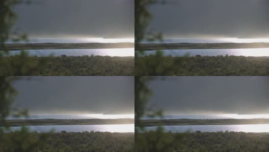 明亮的阳光反射在湖面上高清在线视频素材下载