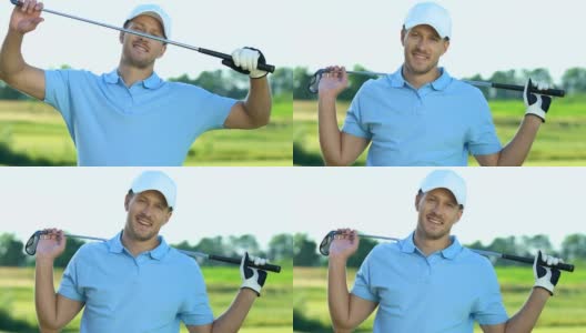 英俊的高尔夫球手在职业制服微笑相机与俱乐部摆姿势高清在线视频素材下载