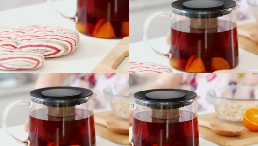 茶壶与果茶和烹饪原料在桌子上高清在线视频素材下载