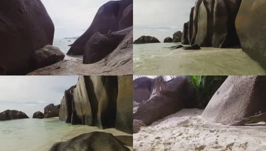 行走在塞舌尔安斯银源海滩的岩石中-拉迪格高清在线视频素材下载