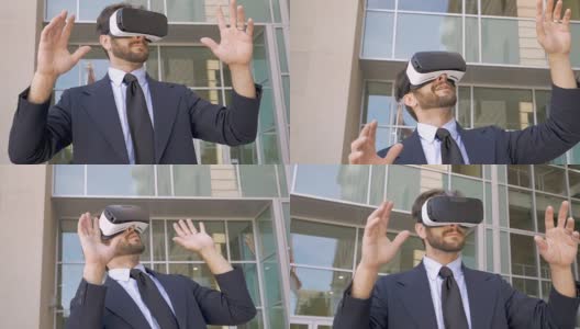 男性商务主管享受虚拟现实体验与VR头盔高清在线视频素材下载