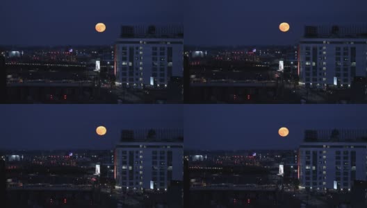 城市上空的蓝月亮高清在线视频素材下载