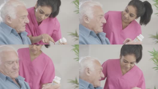 老人在护理之家照顾与护士高清在线视频素材下载
