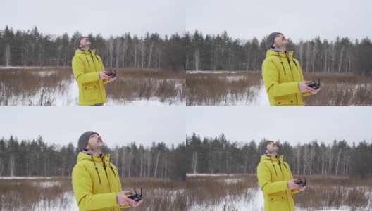 一名男子在雪天发射无人机高清在线视频素材下载