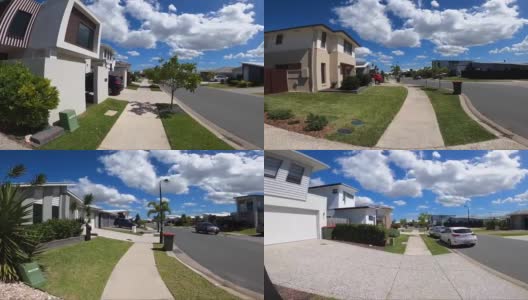 在典型的澳大利亚郊区人行道上骑自行车或滑板高清在线视频素材下载