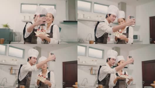 两个亚洲人在家里一起做饭时拍照高清在线视频素材下载