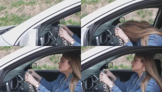 一名沮丧的女性司机驾驶着一辆SUV，引擎无法启动高清在线视频素材下载