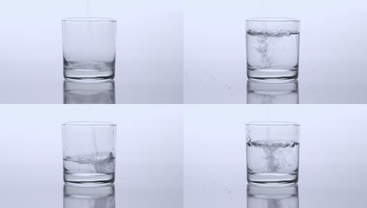 4K特写把饮用水倒进玻璃杯，工作室拍摄高清在线视频素材下载