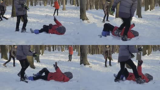 兄弟们在冬季公园玩雪高清在线视频素材下载