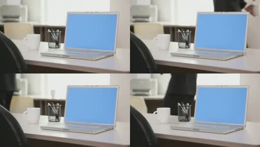 办公室里的蓝屏笔记本电脑高清在线视频素材下载