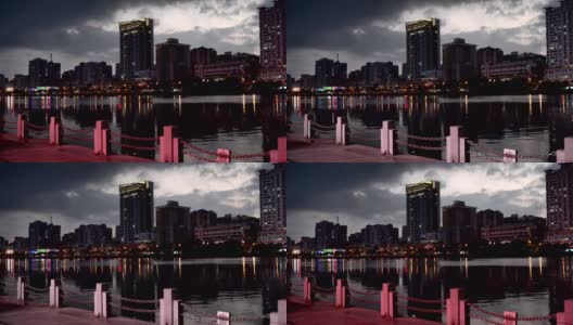 黄昏时分河边的现代化城市高清在线视频素材下载