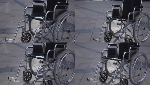 禁止轮椅在现代商业区附近滚动高清在线视频素材下载