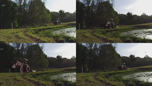 农用拖拉机停在荷塘旁的农村土地上高清在线视频素材下载
