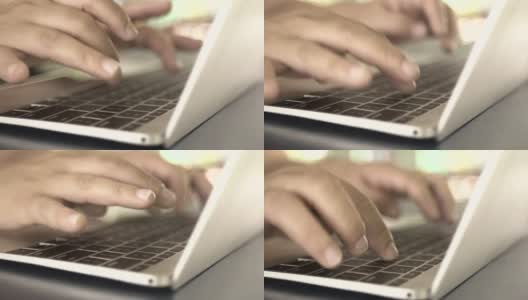 女人在笔记本电脑键盘上打字，特写高清在线视频素材下载