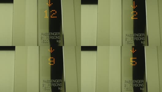 电梯内数字显示楼层编号从12降至0。高清在线视频素材下载