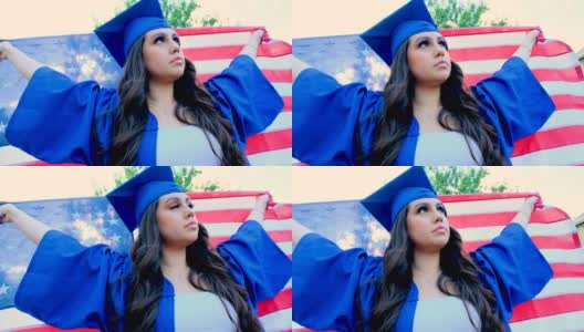 年轻女子举着美国国旗庆祝毕业高清在线视频素材下载